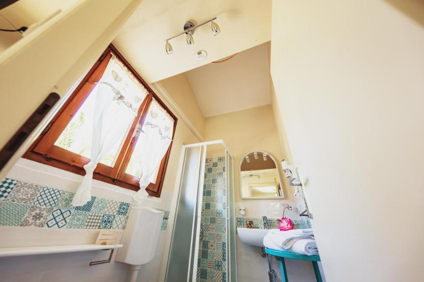 Koupelna v ubytování Residence il Mandorlo