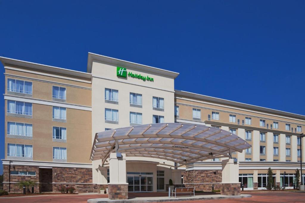 a hotel building with awning in front of it at Holiday Inn Meridian East I 59 / I 20 in Meridian