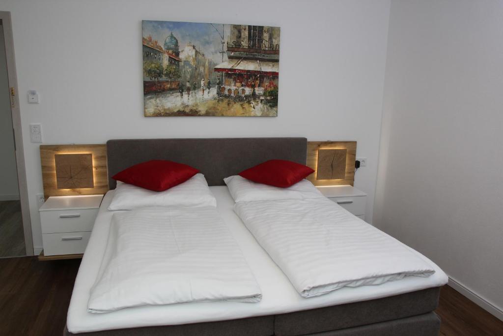 Postel nebo postele na pokoji v ubytování Hotel Am Donaubogen