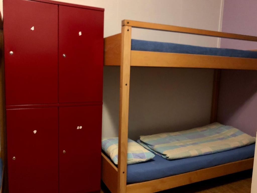 Letto o letti in una camera di Auberge Pour Tous