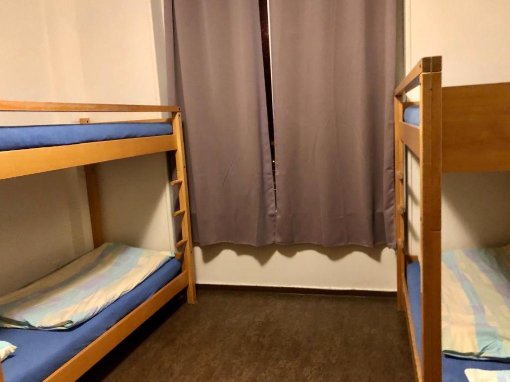Letto o letti in una camera di Auberge Pour Tous
