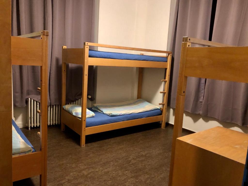 Letto o letti in una camera di Auberge Pour Tous