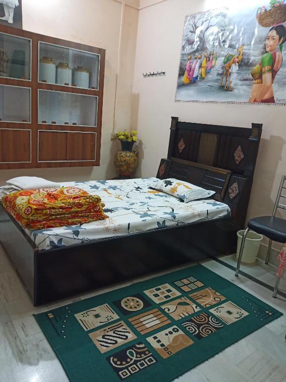 Postel nebo postele na pokoji v ubytování Sunita homestay