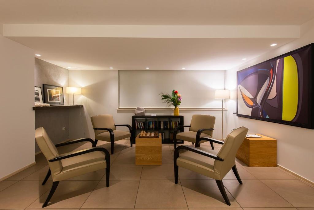 Гостиная зона в Hotel Dimorae Rooms and Suites - Apartments