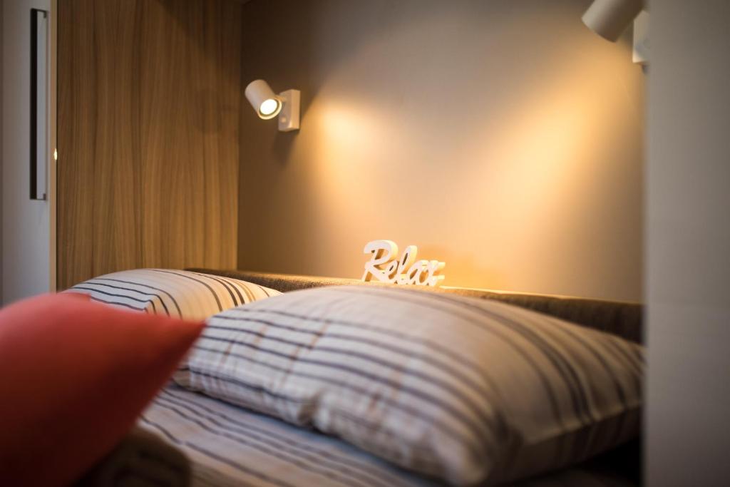 Postel nebo postele na pokoji v ubytování Guest House Krk Town Centre