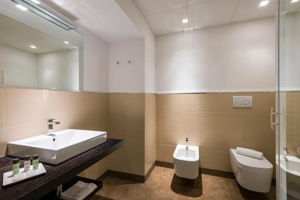 Ванная комната в Hotel Dimorae Rooms and Suites - Apartments