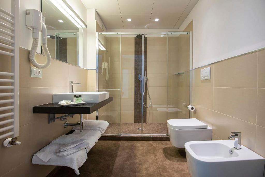 Ванная комната в Hotel Dimorae Rooms and Suites - Apartments