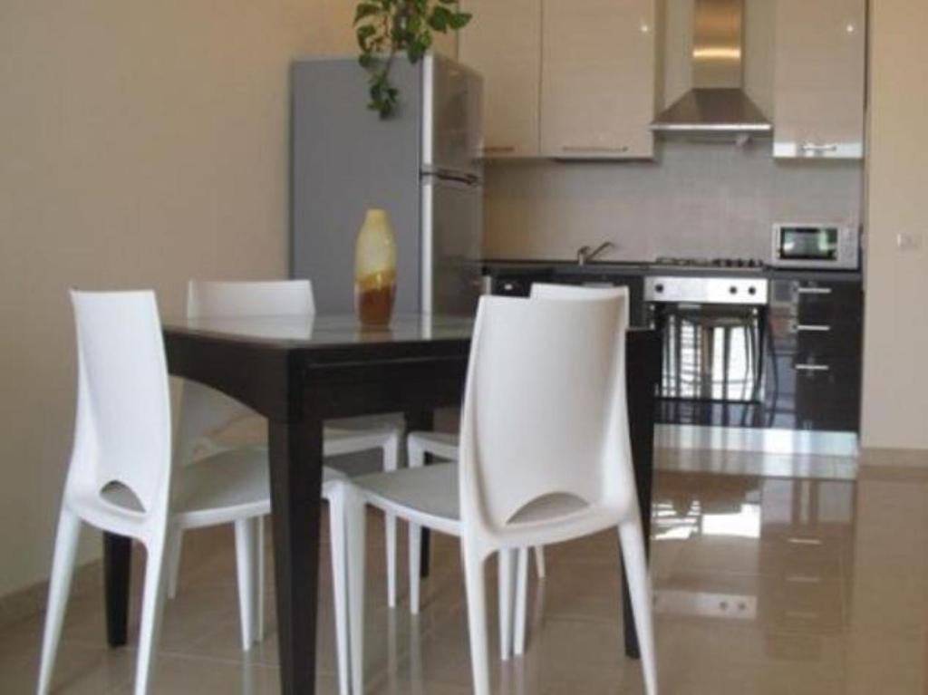 Kuchyň nebo kuchyňský kout v ubytování Residence Mimose