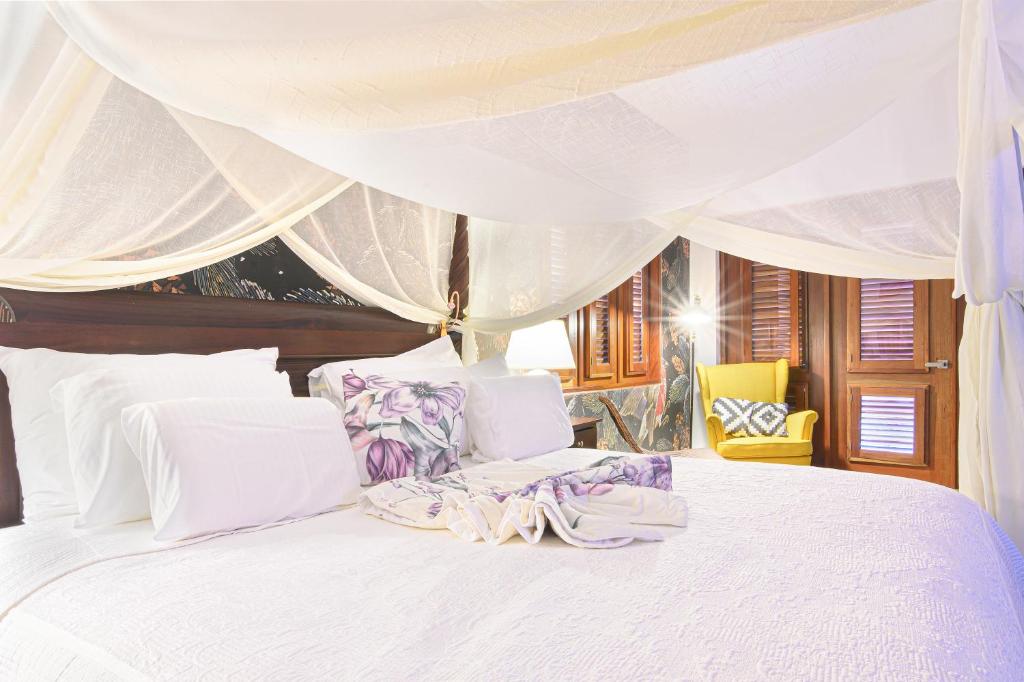 Rúm í herbergi á Selectum Hacienda Punta Cana