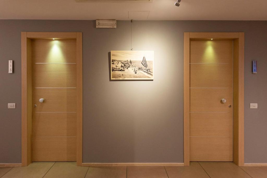 Фотография из галереи Hotel Dimorae Rooms and Suites - Apartments в Чивитанова-Марке
