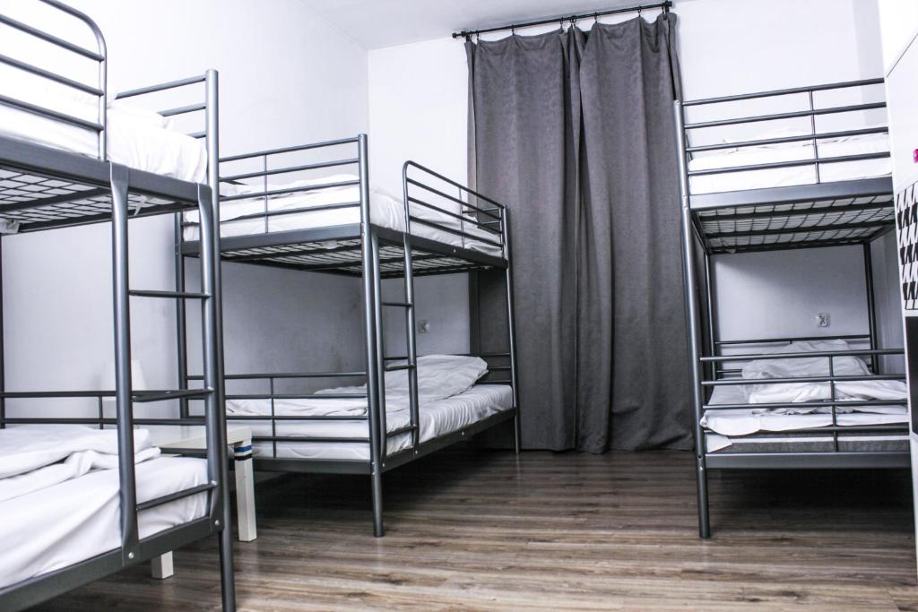 Posteľ alebo postele v izbe v ubytovaní Baba Hostel