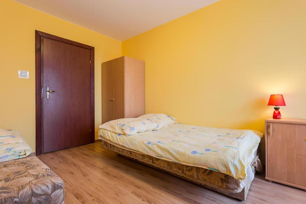 Posteľ alebo postele v izbe v ubytovaní POKOJE u JÓZKA