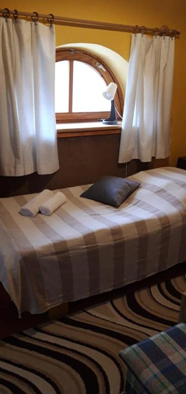 Postel nebo postele na pokoji v ubytování Agave Apartman