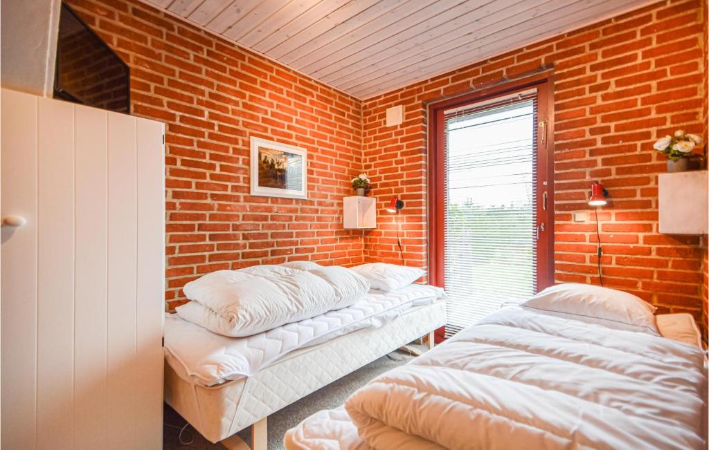 Postel nebo postele na pokoji v ubytování Stunning Home In Rømø With Wifi