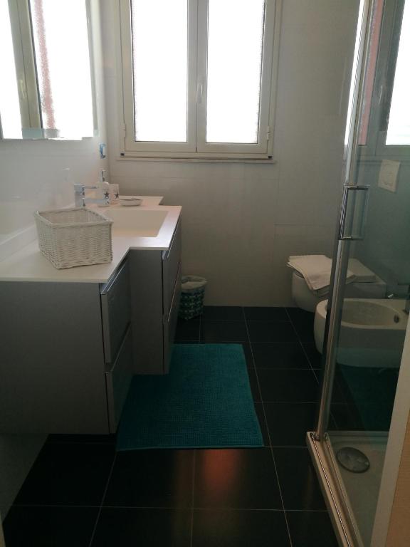 Kúpeľňa v ubytovaní casa vacanze Thea