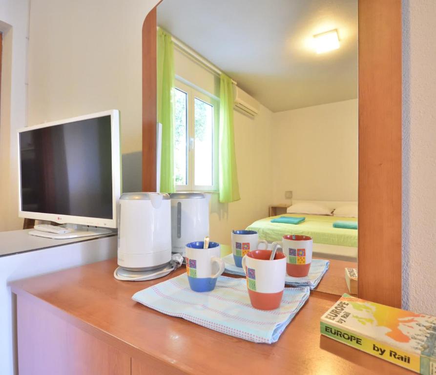 Kuchyň nebo kuchyňský kout v ubytování Room 4 Two