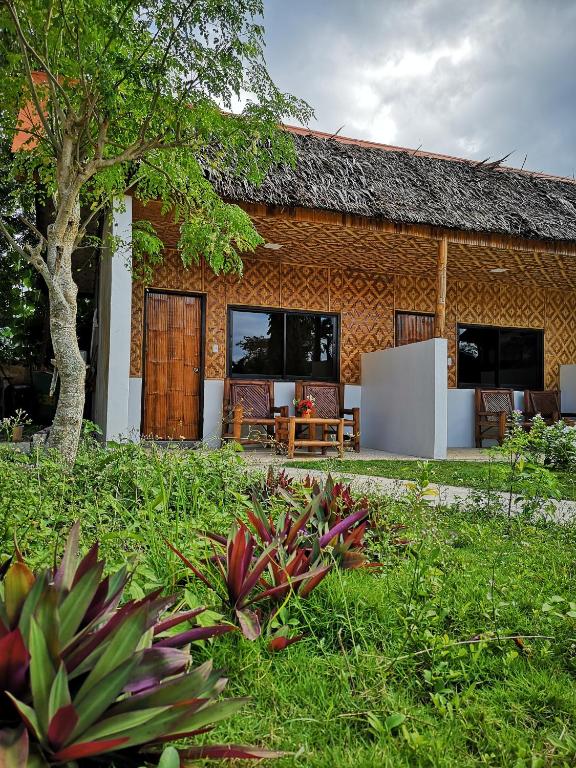 Zahrada ubytování Native House Resort by Cocotel