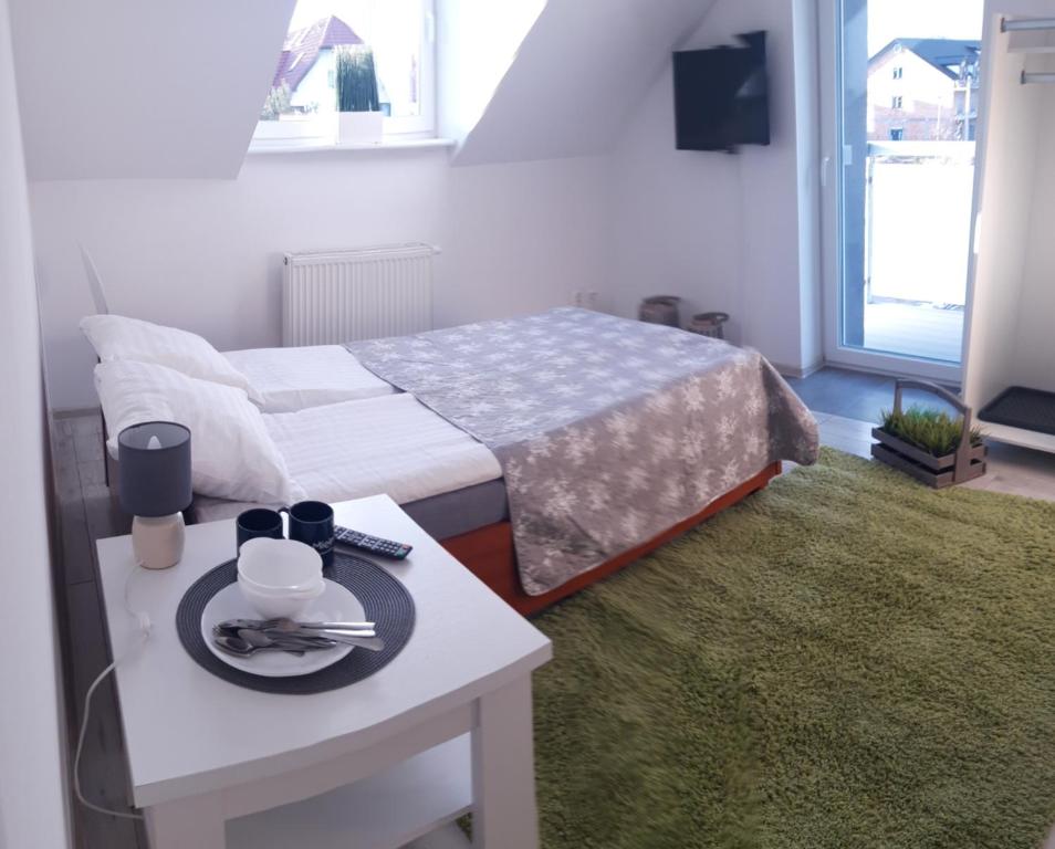 Postel nebo postele na pokoji v ubytování Azalia 32 Mielno l