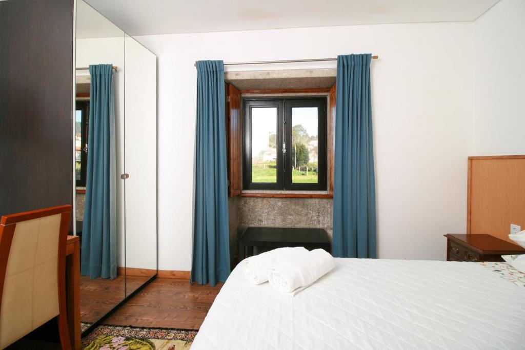 Postel nebo postele na pokoji v ubytování Dias House