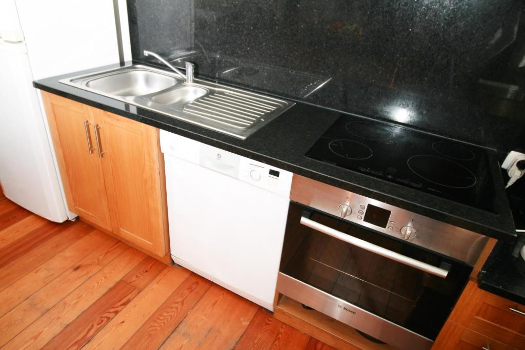 Kuchyň nebo kuchyňský kout v ubytování Dias House
