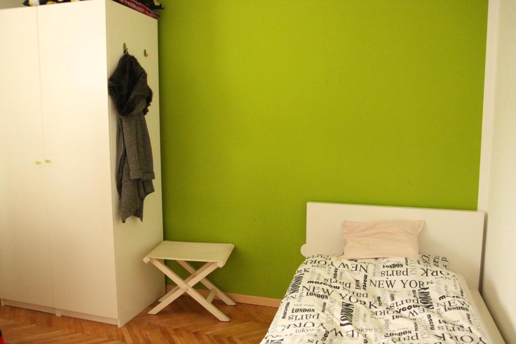 Postel nebo postele na pokoji v ubytování HAPPY & COSY place, Via Trieste