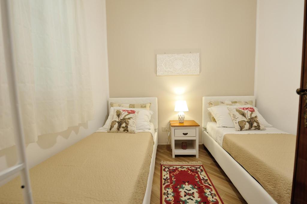Łóżko lub łóżka w pokoju w obiekcie Terra Sinus Holiday House