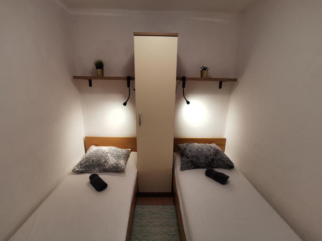 Posteľ alebo postele v izbe v ubytovaní Bugenvila