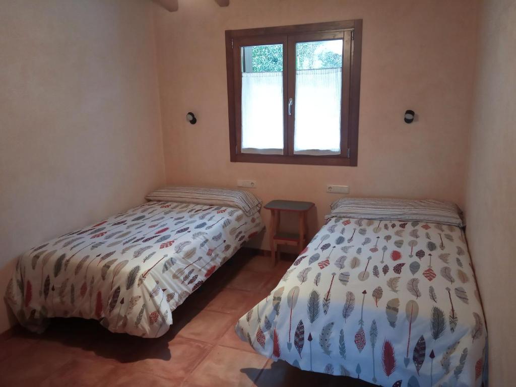 Postel nebo postele na pokoji v ubytování Xarma