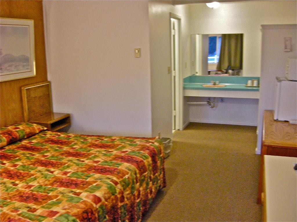 Postel nebo postele na pokoji v ubytování Motel 101