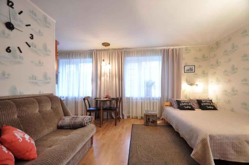 Postel nebo postele na pokoji v ubytování Grafovi Apartments