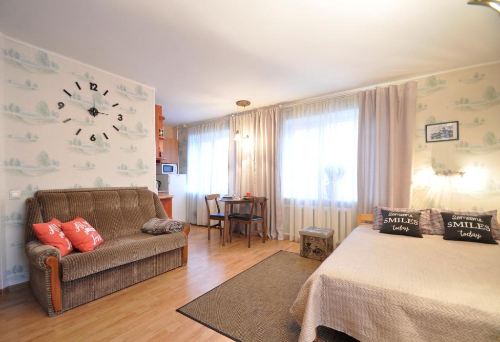 Postel nebo postele na pokoji v ubytování Grafovi Apartments