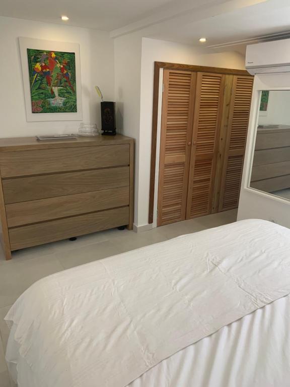 Postel nebo postele na pokoji v ubytování Coco Beach
