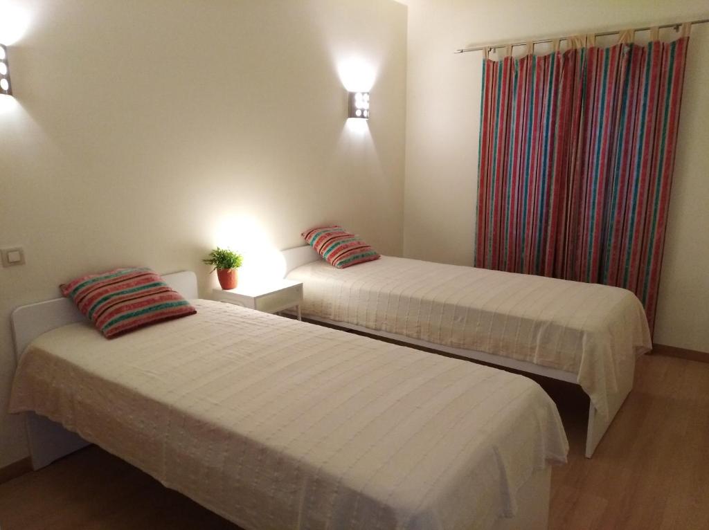 Cama o camas de una habitación en Dom Manuel