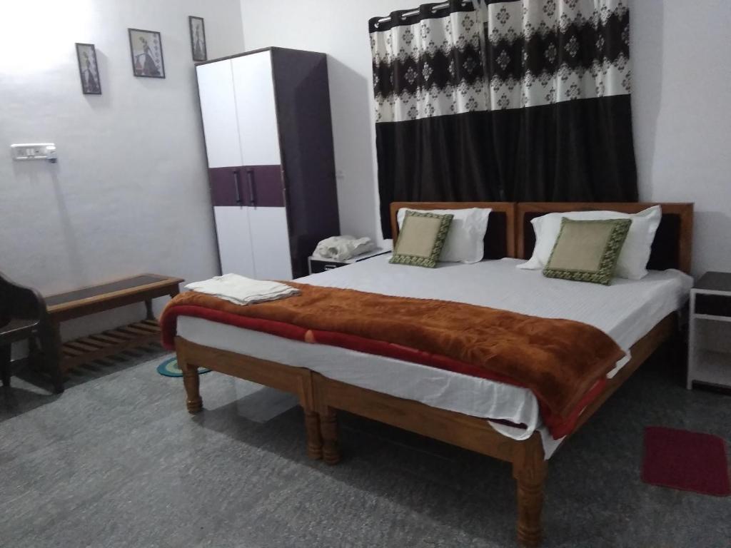 Postel nebo postele na pokoji v ubytování Happy Homestay