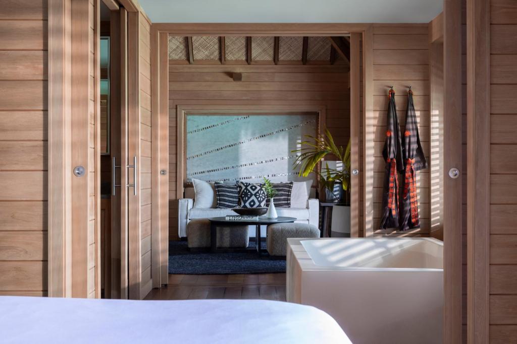 Postel nebo postele na pokoji v ubytování Four Seasons Resort Bora Bora