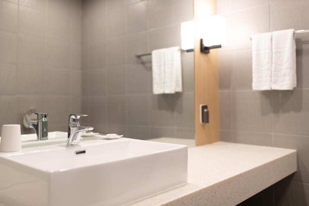 Koupelna v ubytování Hotel Winstory