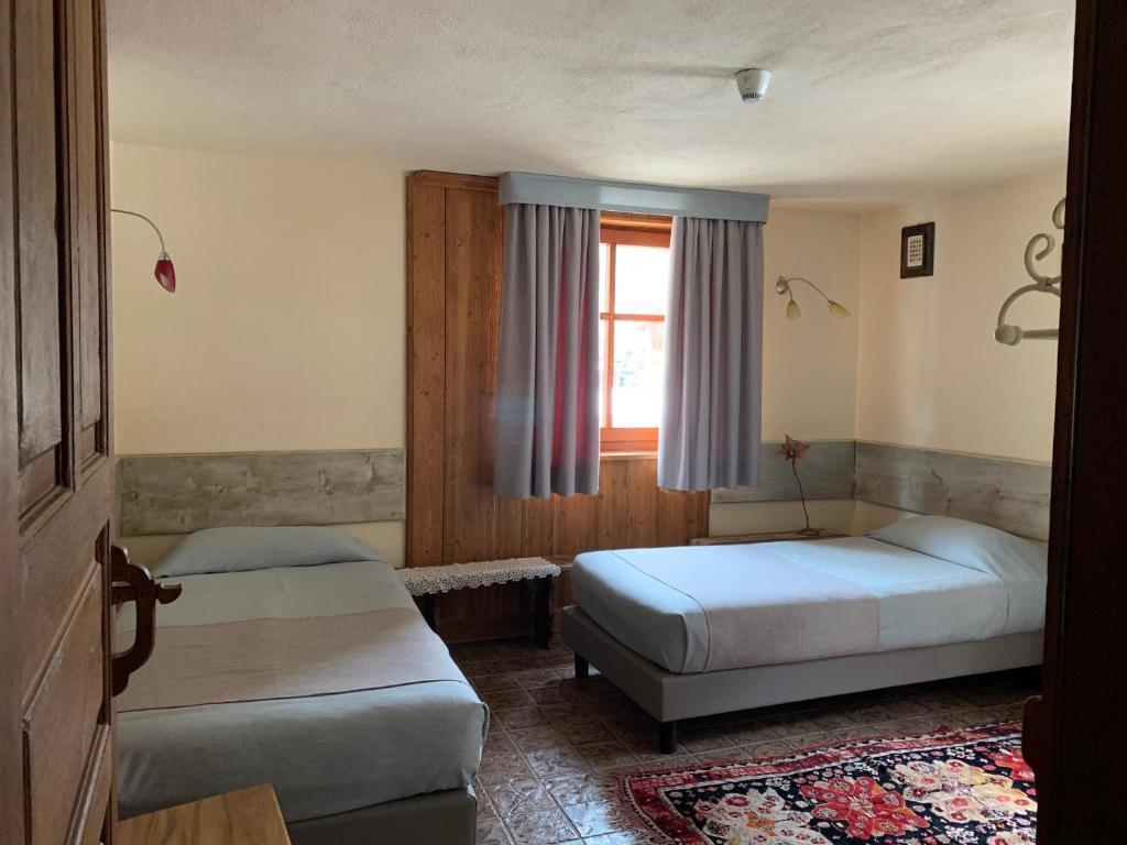 Postel nebo postele na pokoji v ubytování Hotel Lyshaus