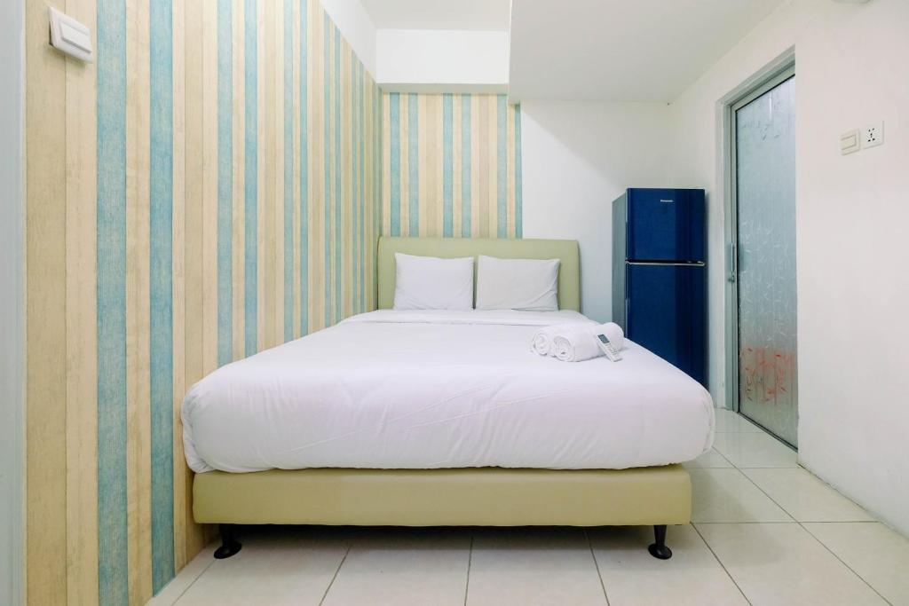 Best Price 1BR Apartment at Teluk Intan By Travelio - Housity