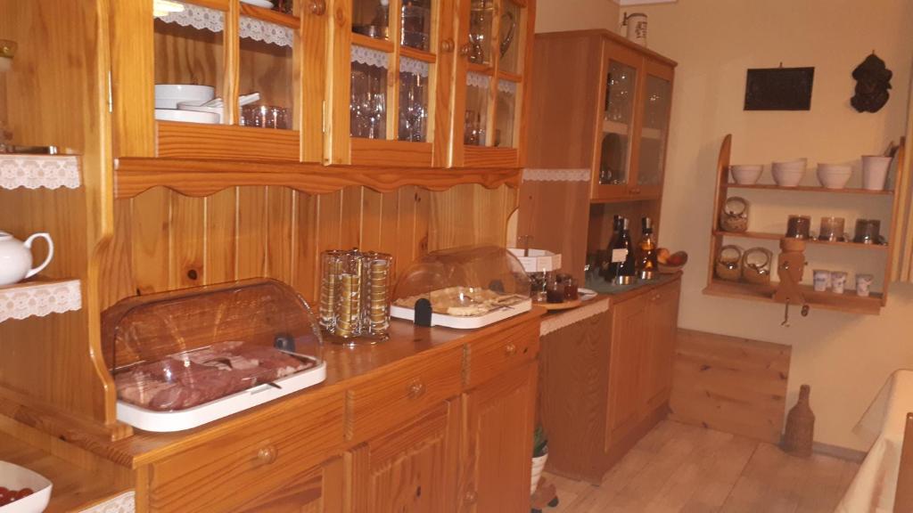 Kuchyň nebo kuchyňský kout v ubytování Gästehaus Strini
