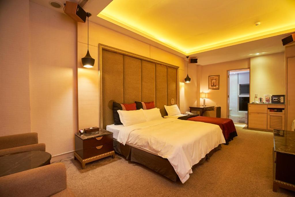 Postel nebo postele na pokoji v ubytování Dongfeng Motel