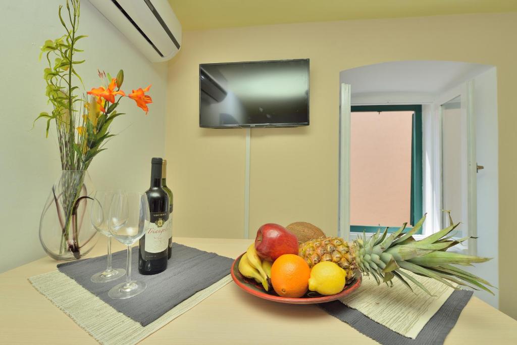 Telewizja i/lub zestaw kina domowego w obiekcie Apartments Carpe Diem
