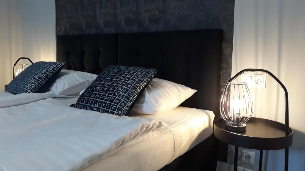 Posteľ alebo postele v izbe v ubytovaní Liza Lux Apartments I Old Town