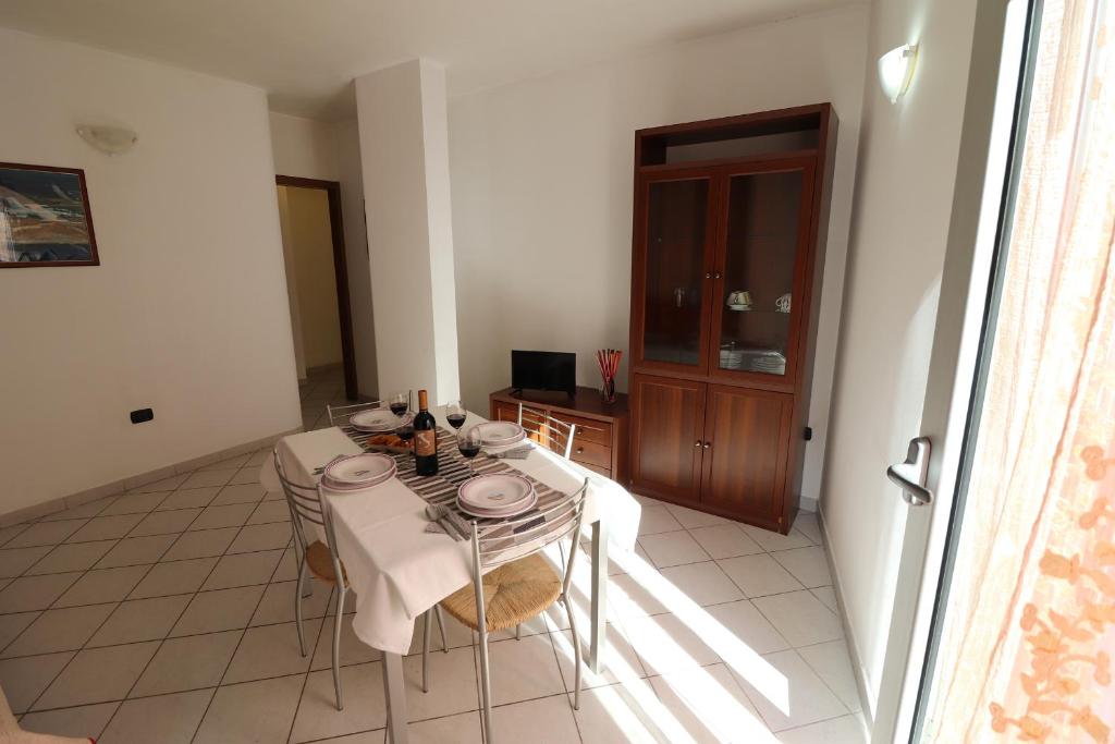 Televízia a/alebo spoločenská miestnosť v ubytovaní Casa vacanze clio centro Otranto, Salento 6 posti