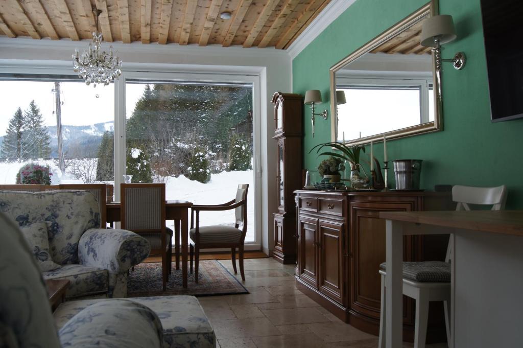 Posezení v ubytování Land - Haus