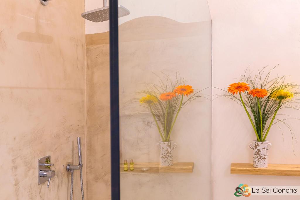 Łazienka w obiekcie Le Sei Conche Relais & SPA