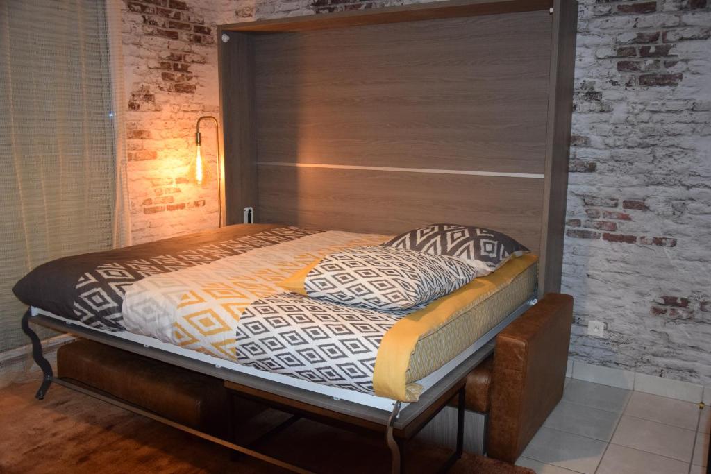 Postel nebo postele na pokoji v ubytování Ces jours en baie Le vue mer