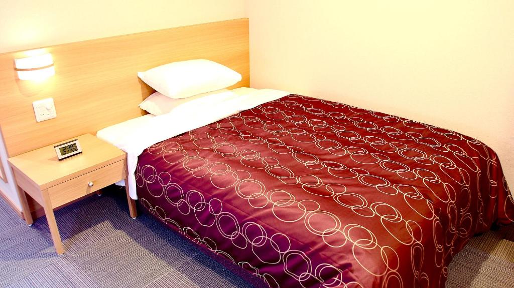 Postel nebo postele na pokoji v ubytování HOTEL SOSHA