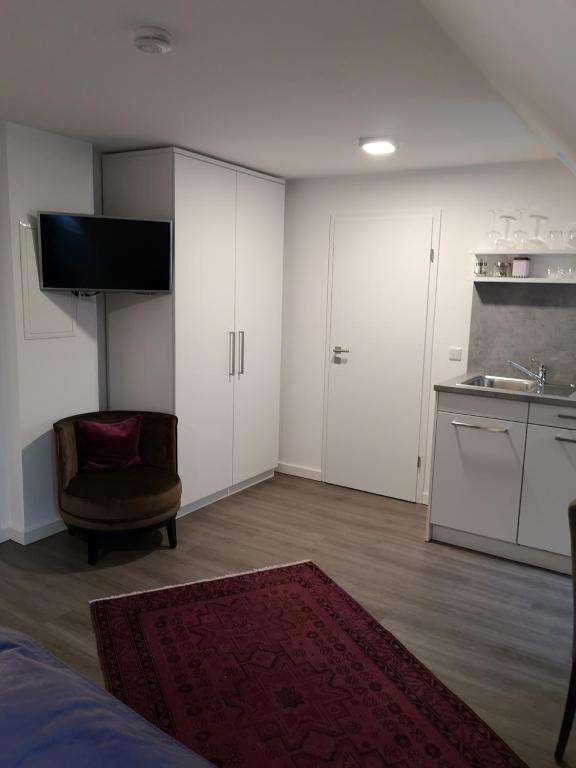 Kuchyň nebo kuchyňský kout v ubytování Trip Inn PostApart Aschaffenburg