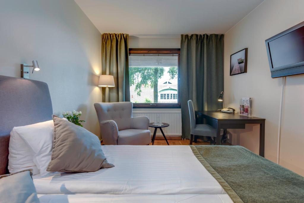 TV a/nebo společenská místnost v ubytování Hotel Bellevue