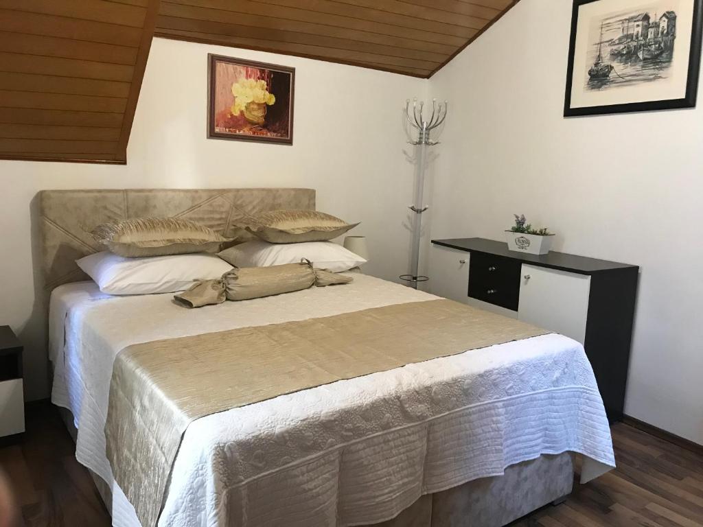 a bedroom with a large bed in a room at Center apartment Neno in Split